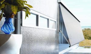 Enhancing Privacy and Light Control with Pivot Arm Awnings